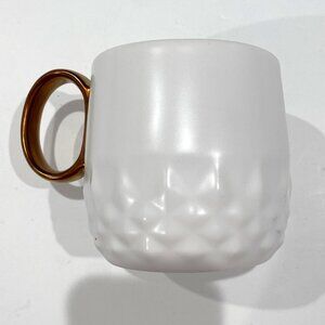 Starbucks 2013 white diamond embossed bronze handle coffee mug, 12 oz. EUC.